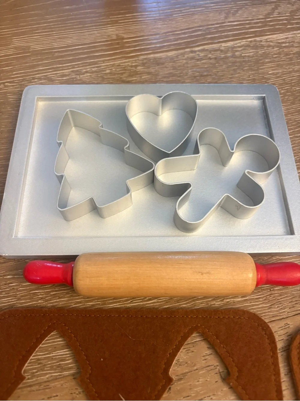 Hape Felt Gingerbread Playset with Rolling Pin and Cookie Cutters also at PBK